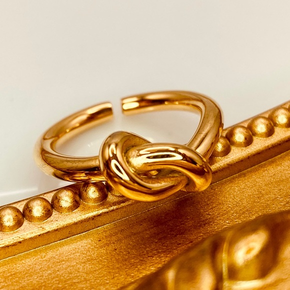 Minimalist Knot Open ring design in 18K Gold- Titanium Steel. - Picture 1 of 5